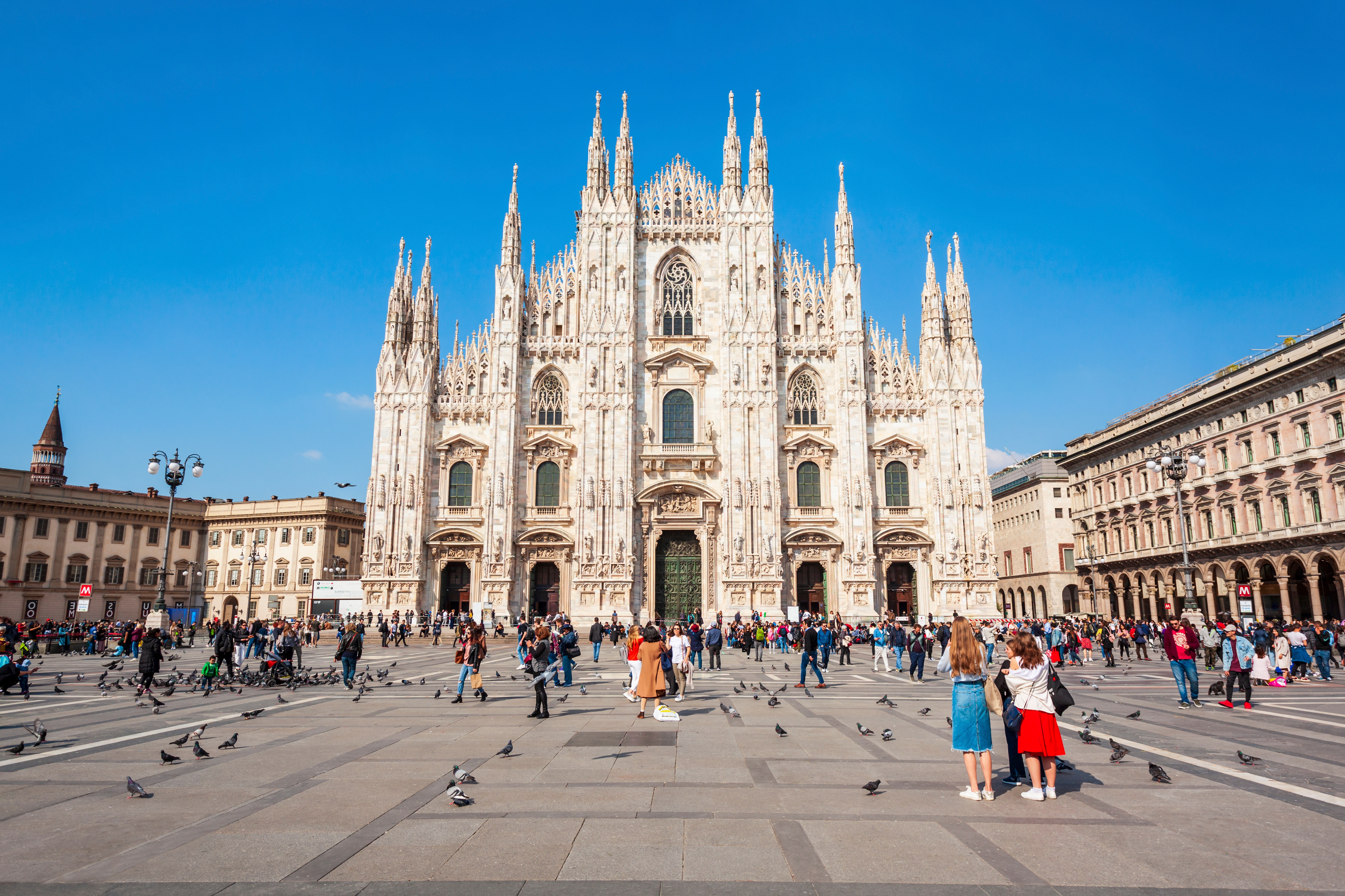 rowd of tourist on Cathedral square Piazza del Duomo on front of Milan Cathedral